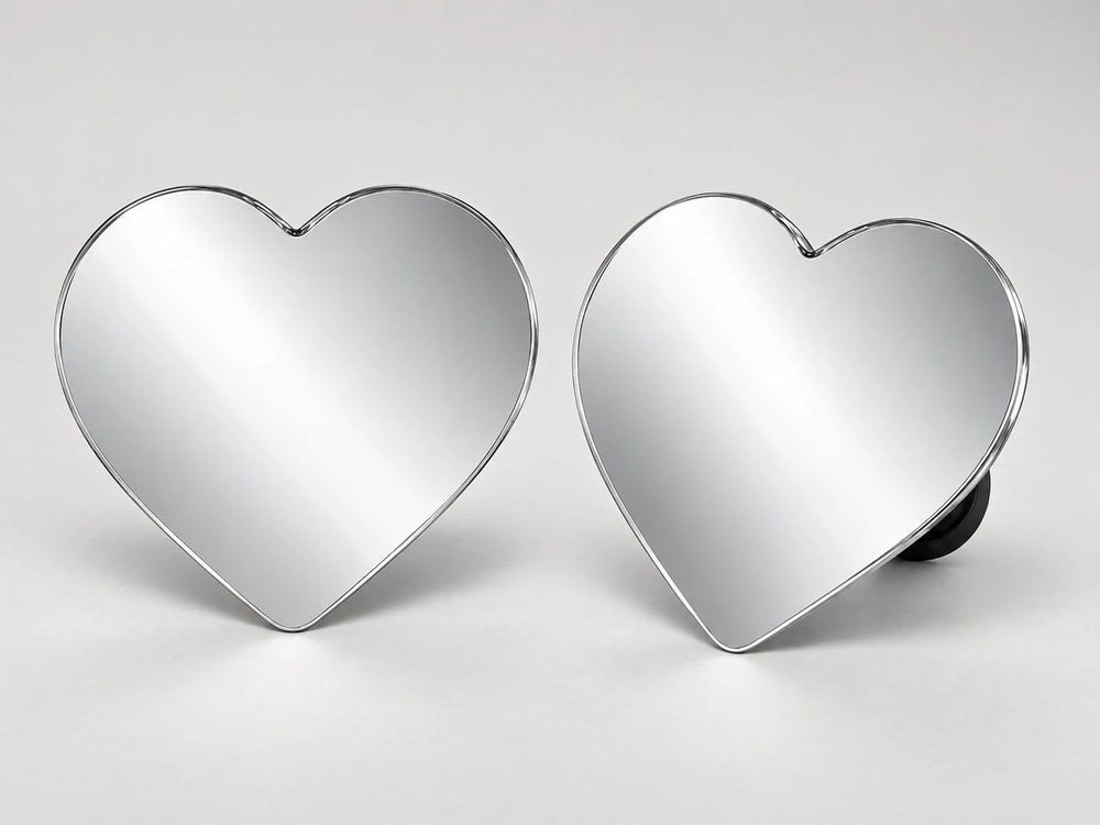 Two matching heart mirrors, one for each side