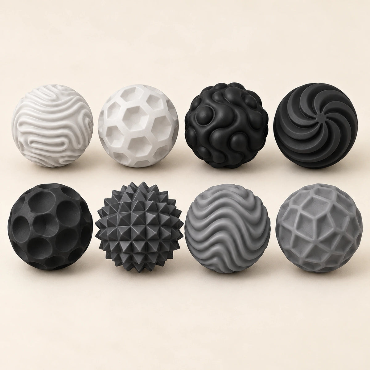 Black: Eight different silicone textures on a set of magnetic fidget balls